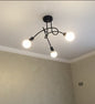 Lampadario minimalista creativo in ferro con tubo di ferro